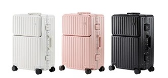 3 suitcases in white, pink, and black